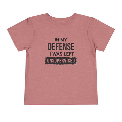 Funny Toddler Tee - "In My Defense I Was Left Unsupervised" - Cute Gift for Kids, Humor Tee, Playtime Wear, Birthday Shirt, Family [...]