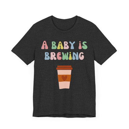 A baby is brewing tee.