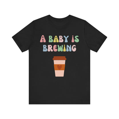 A baby is brewing tee.