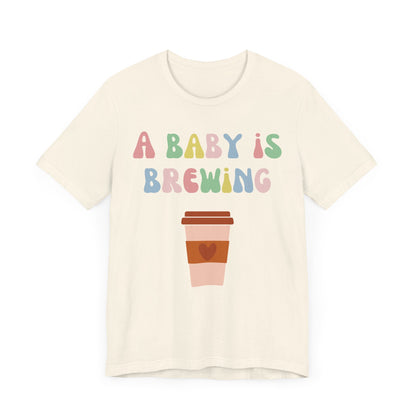 A baby is brewing tee.